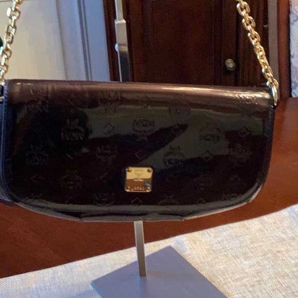 MCM Chocolate Embossed Clutch with Gold Chain - Picture 3 of 17